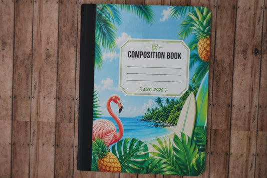 Composition book with tropical design on a wooden surface